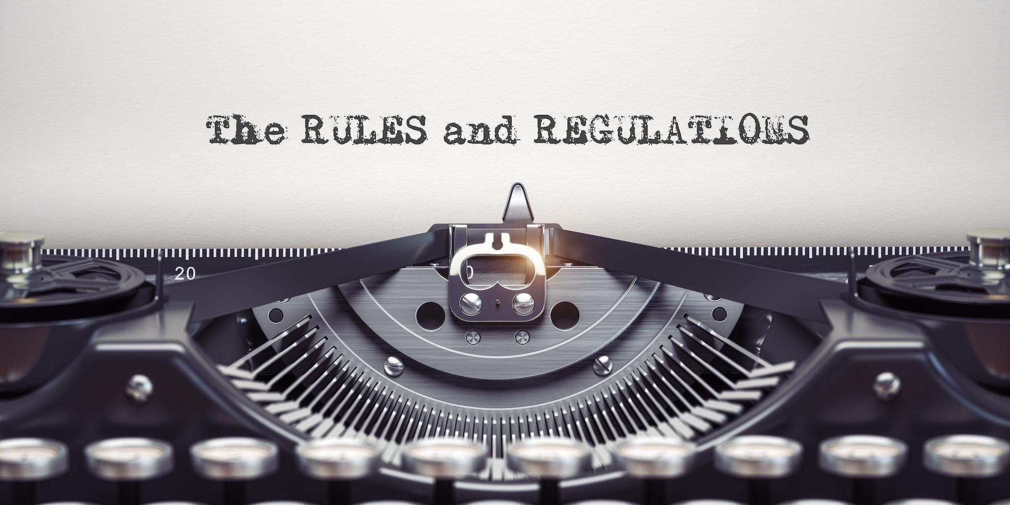 Rules and regulationswritten by typewriter. Typewriter and text on white sheet. Ilustrasi PSAK 24 - Pengertian dan Prinsip Dasar, membahas imbalan kerja dalam konteks akuntansi.